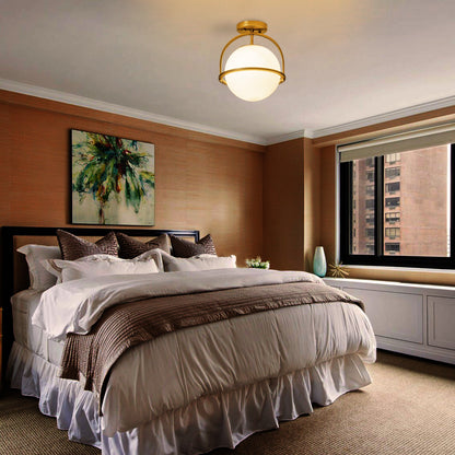 C Cattleya 1-Light Antique Brass Sphere Semi Flush Mount with Opal Glass Shade - Antique Brass