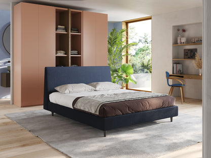 Dorotea letto imbottito con piedi in legno in morbido bouclé impermeabile T07 blu 