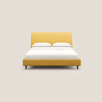 Dorotea letto imbottito con piedi in legno in morbido bouclé impermeabile T07 giallo 