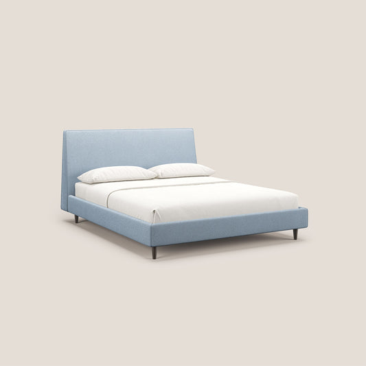 Dorotea letto imbottito con piedi in legno in morbido bouclé impermeabile T07 carta da zucchero 