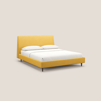 Dorotea letto imbottito con piedi in legno in morbido bouclé impermeabile T07 giallo 