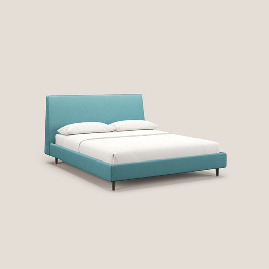 Dorotea letto imbottito con piedi in legno in morbido bouclé impermeabile T07 azzurro 