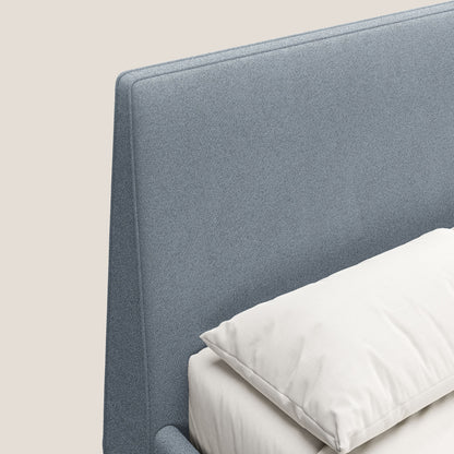 Dorotea letto imbottito con piedi in legno in morbido bouclé impermeabile T07 carta da zucchero 