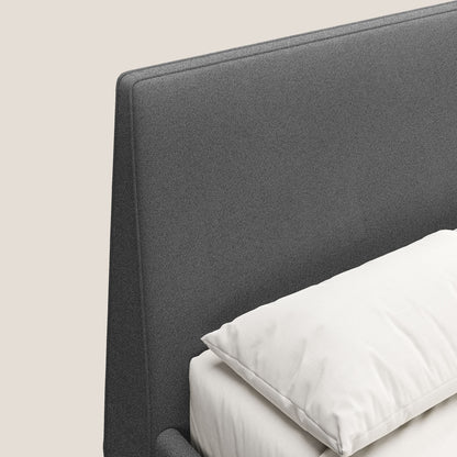 Dorotea letto imbottito con piedi in legno in morbido bouclé impermeabile T07 antracite 