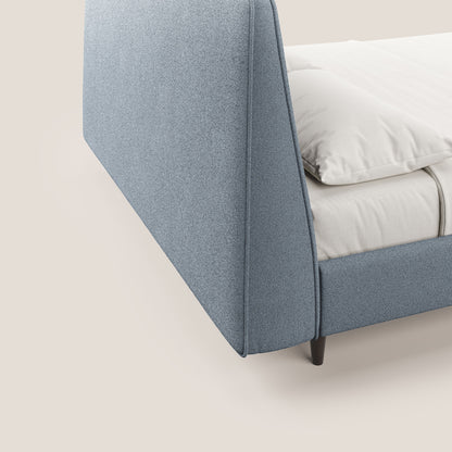 Dorotea letto imbottito con piedi in legno in morbido bouclé impermeabile T07 carta da zucchero 