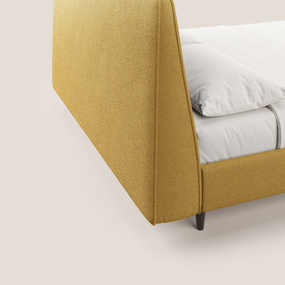Dorotea letto imbottito con piedi in legno in morbido bouclé impermeabile T07 giallo 