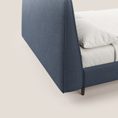 Dorotea letto imbottito con piedi in legno in morbido bouclé impermeabile T07 blu 