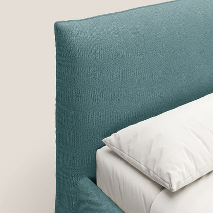 EROS letto imbottito in piuma con vano contenitore in pregiato e fresco bouclet smacchiabile T16 azzurro 
