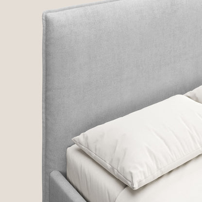 Iris letto imbottito con piedini neri sfoderabile in tessuto impermeabile T02 grigio chiaro 